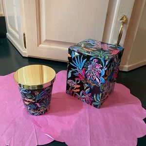 Light up your room with this Lilly Pulitzer candle the decorated glass is Lilly!